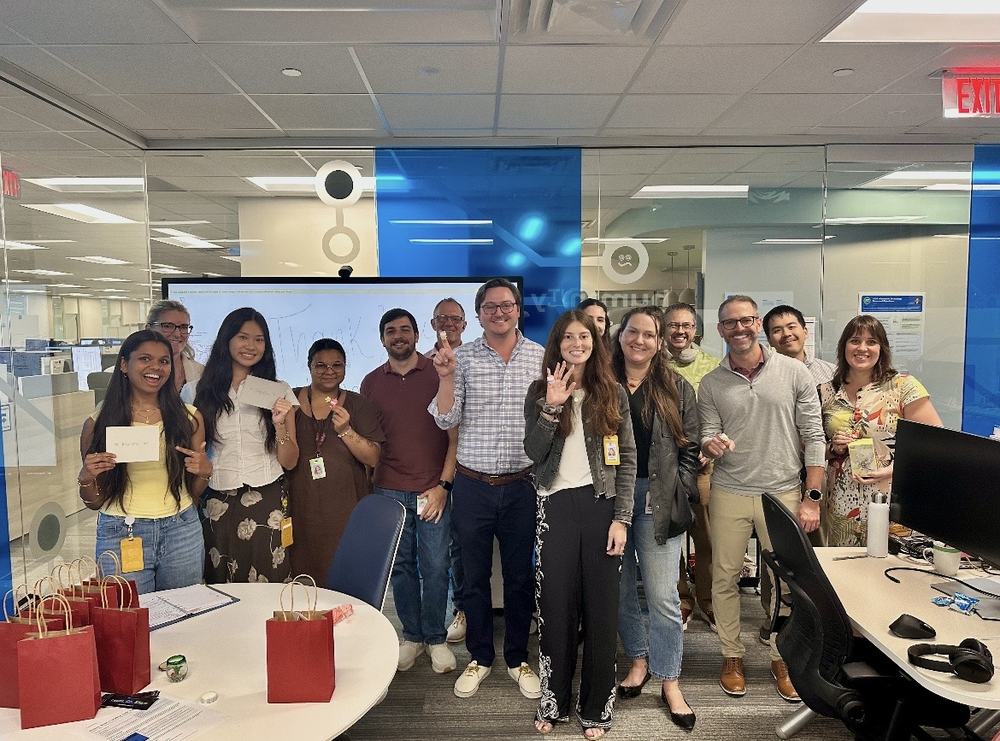 The HumanITy team posing in the office