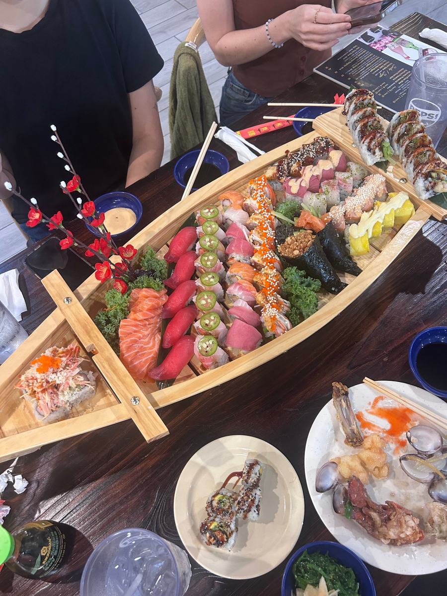 A boat of sushi on a table