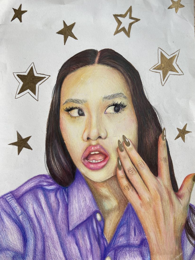 Portrait of a girl in a purple shirt surrounded by gold stars